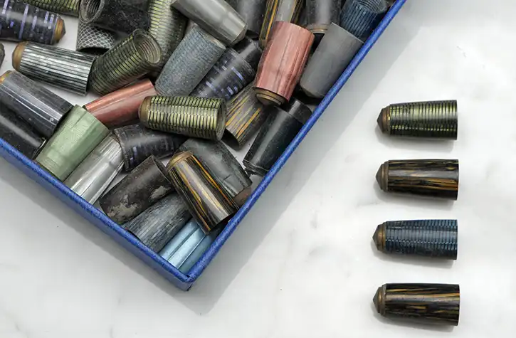 Fountain pen back caps, finials